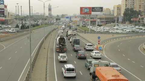 Highway traffic, upper view, city is in the background, traffic jam Stock Footage 55843273