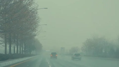 Highway under snowfall Stock Footage 146890374