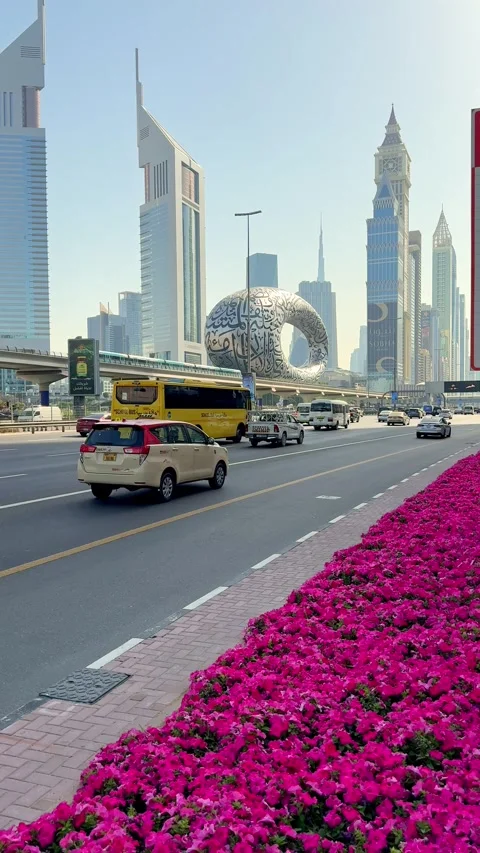 Highway view of Sheikh Zayed Road in Dubai with heavy traffic. Metro line and Stock Footage 306574250
