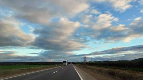 Highway view through a car windshield Vídeos de archivo 303869954