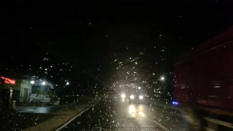 On the highway when it's drizzling at night Stock Footage 221140989