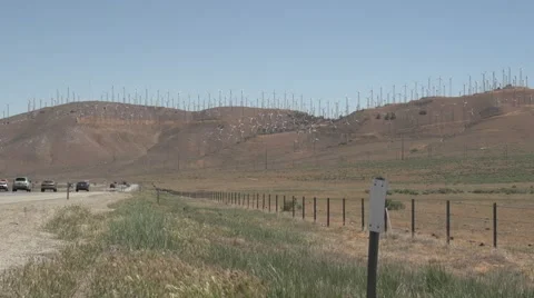 Highway with windmills in the distance Stock Footage 49405577