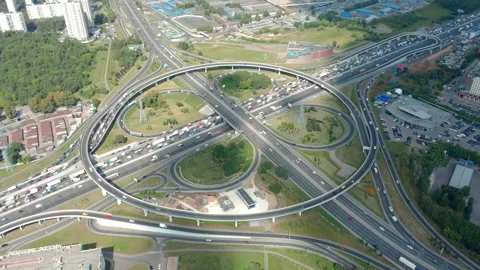 Highway's intersections of big city in timelapse. Clouds covering ground. Aerial Video stock 139886208