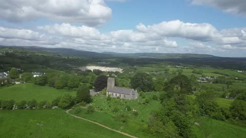 Highweek, South Devon, England: DRONE AERIAL VIEWS: All Saints Church &amp; Dartmoor Stock Footage 241336677