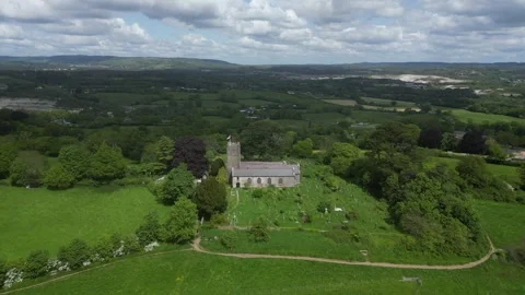 Highweek, South Devon, England: DRONE AERIAL VIEWS: All Saints Church &amp; Dartmoor Stock Footage 241336867