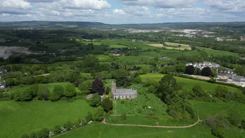Highweek, South Devon, England: DRONE AERIAL VIEWS: All Saints Church &amp; Dartmoor Stock Footage 241337187