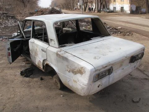 Hijacked and a crashed car in the spring city street Stock-Fotos
