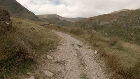 Hike along trail heading to Small Water Tarn Stock Footage 161357104