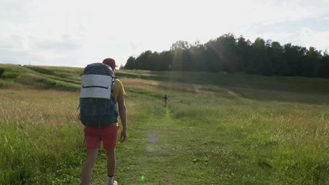Hike in a beautiful field 動画素材 135415775