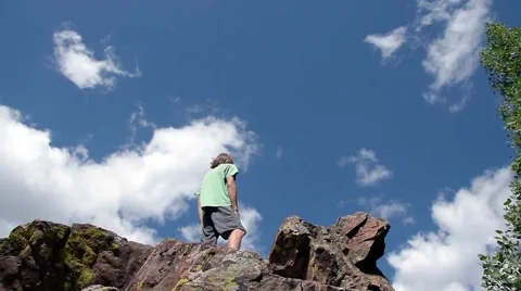 Hiker admires mountain view. Stock Footage 53373757