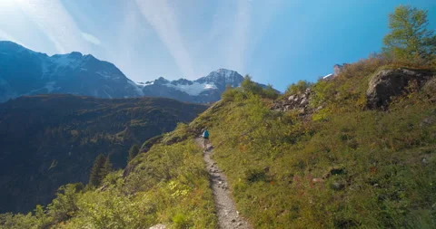 Hiker Ascending Mountain Stock Footage 169896701