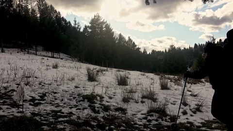 Hiker, with backpack, is climbing on the mountain range Stock Footage 124695210