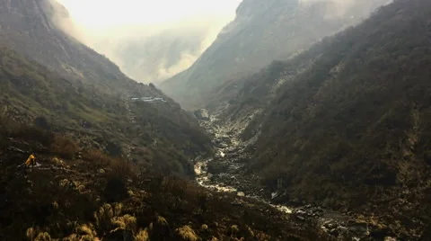 Hiker backpack go mountain valley road river. Himalayas Nepal nature HD video Stock Footage 64828752