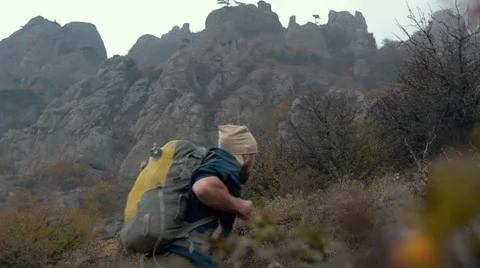 Hiker with backpack in the mountains Video stock 63028247