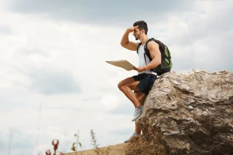 Hiker with a backpack Stock Photos