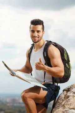 Hiker with a backpack Stock Photos