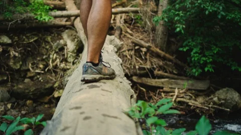 Hiker with Backpack walks in mountains Stock Footage 127461431