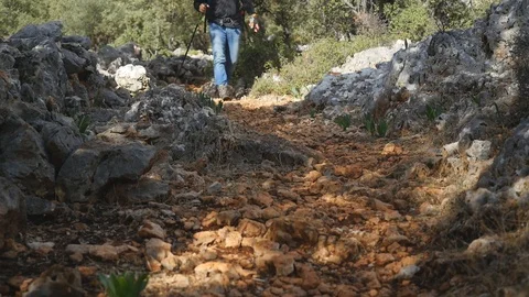 Hiker with backpack on the walkway Stock Footage 104087820