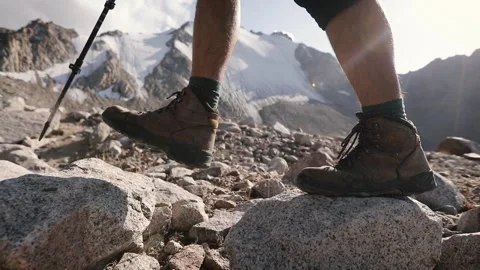 Hiker with big backpack in the mountains Stock-Footage 243877280
