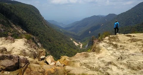 Hiker on the cliff Stock Footage 88272439