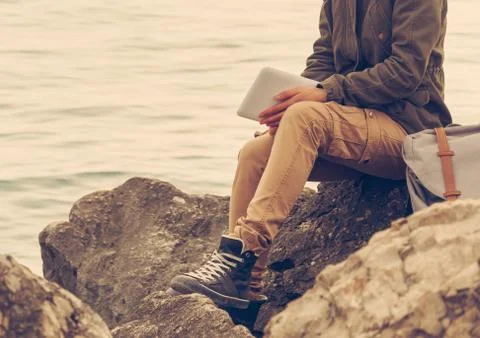 Hiker with digital tablet Stock Photos