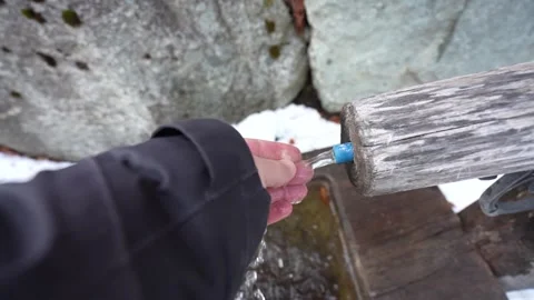 Hiker drinking fresh spring water from hand Stock-Footage 328450220