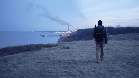 Hiker at dusk Stock Footage 230588616