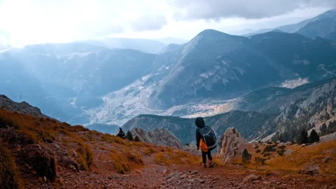 Hiker exploring rugged trails in the Pyrenees mountains of Spain Video stock 300385201