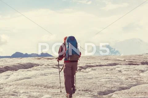 Hiker on glacier Stock Photos