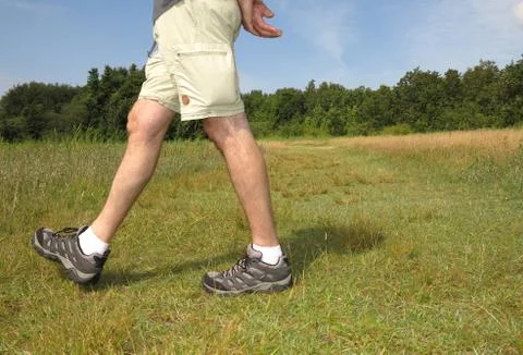 Hiker on grass Stock Photos