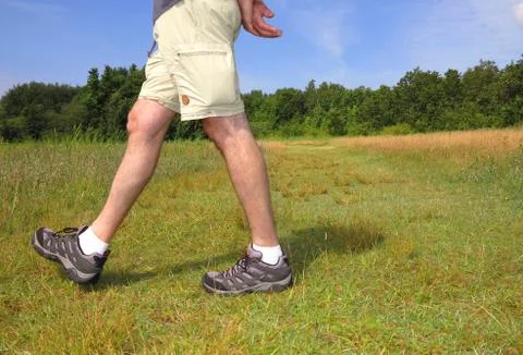 Hiker on grass Stock Photos