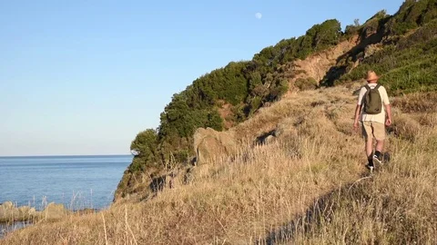 Hiker on the hill Stock Footage 74997830