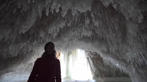 A hiker looking at ice formations Stock Footage 144782832
