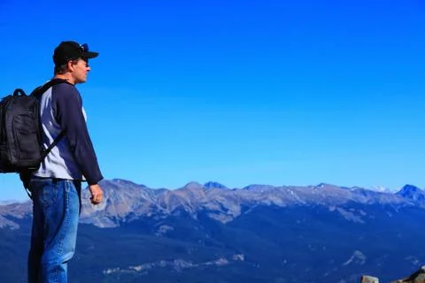 Hiker on mountain range Stock Photos