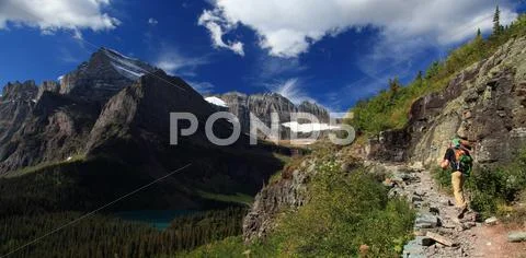 Hiker on Mountain trail 02 Stock Photos