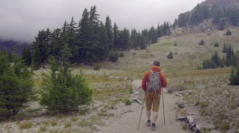 Hiker on mountain trail Stock Footage 59307959