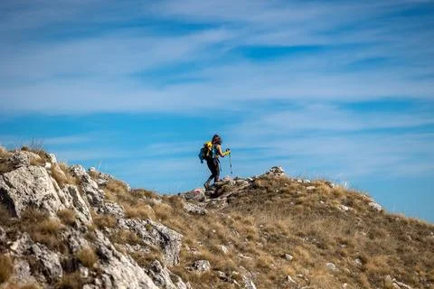 Hiker on the mountain trail Stock Photos