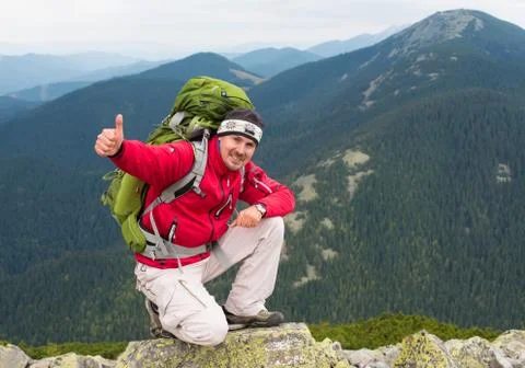 Hiker in mountains Stock Photos