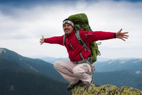 Hiker in mountains Stock Photos