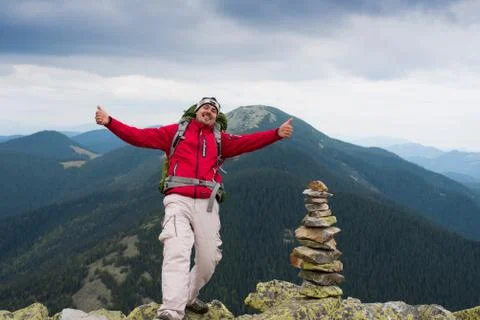 Hiker in mountains Stock Photos