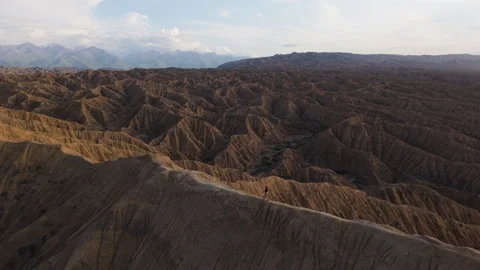 Hiker Over Dramatic Rock Formations Of The Fairytale Canyon In Kyrgyzstan 動画素材 321459384