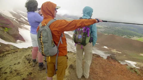 Hiker points to beautiful views Stock Footage 59516355