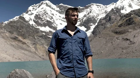 Hiker Sending A Text Message in the Peruvian Andes, Ausangate Stock Footage 125280549