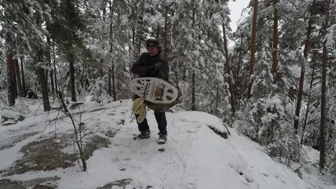 Hiker slinging his backpack on his back Stock Footage 145953751