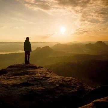 Hiker stand on the sharp corner of sandstone rock in rock empires park and... Stock Photos