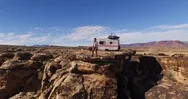 Hiker Standing On The Cliff Near The Camper Van Stock Footage