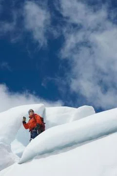 Hiker Standing On Ice Chunks Stock Photos