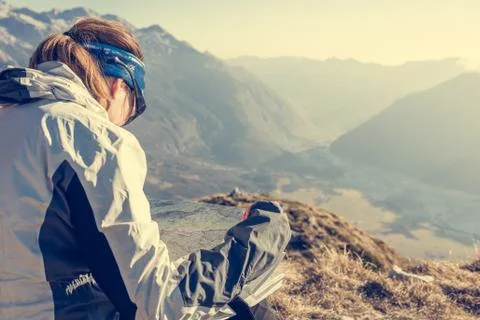 Hiker studying a map. Stock Photos