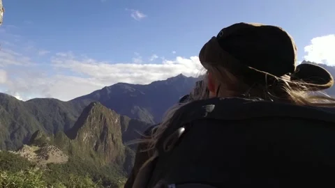 Hiker taking photo on Inca trail to Machu Picchu, Cusco, Peru Stock Footage