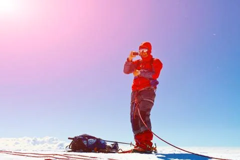 Hiker at the top of a mount Stock Photos